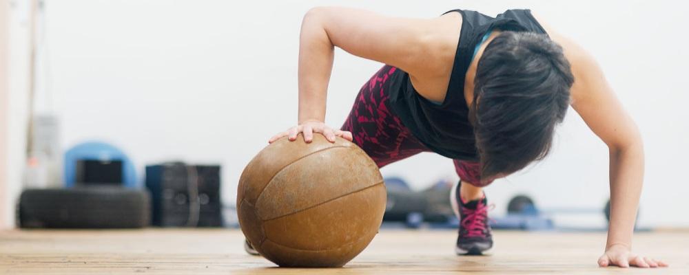 Personal trainer gym ball