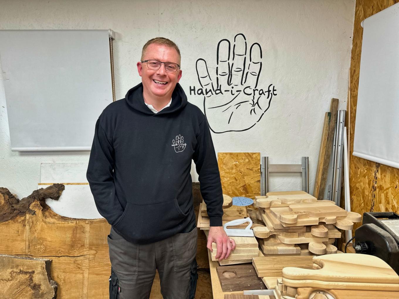 man entrepreneur in a wood workshop